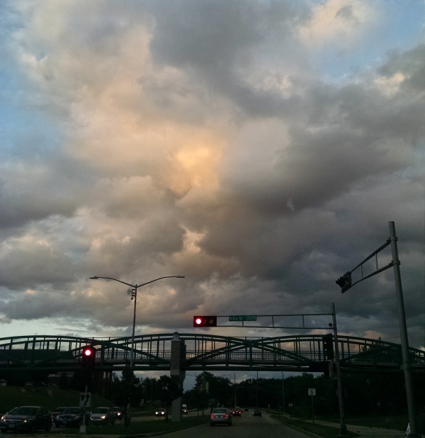 clouds over a bridge